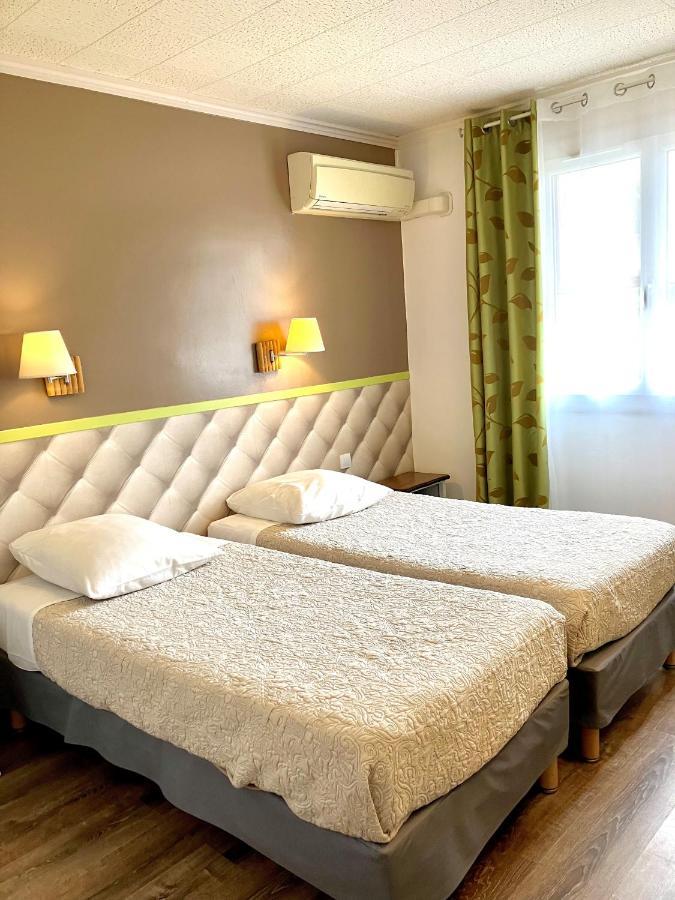 Hotel Lou Marques แซ็งต์-มารี-เดอ-ลา-แมร์ ภายนอก รูปภาพ