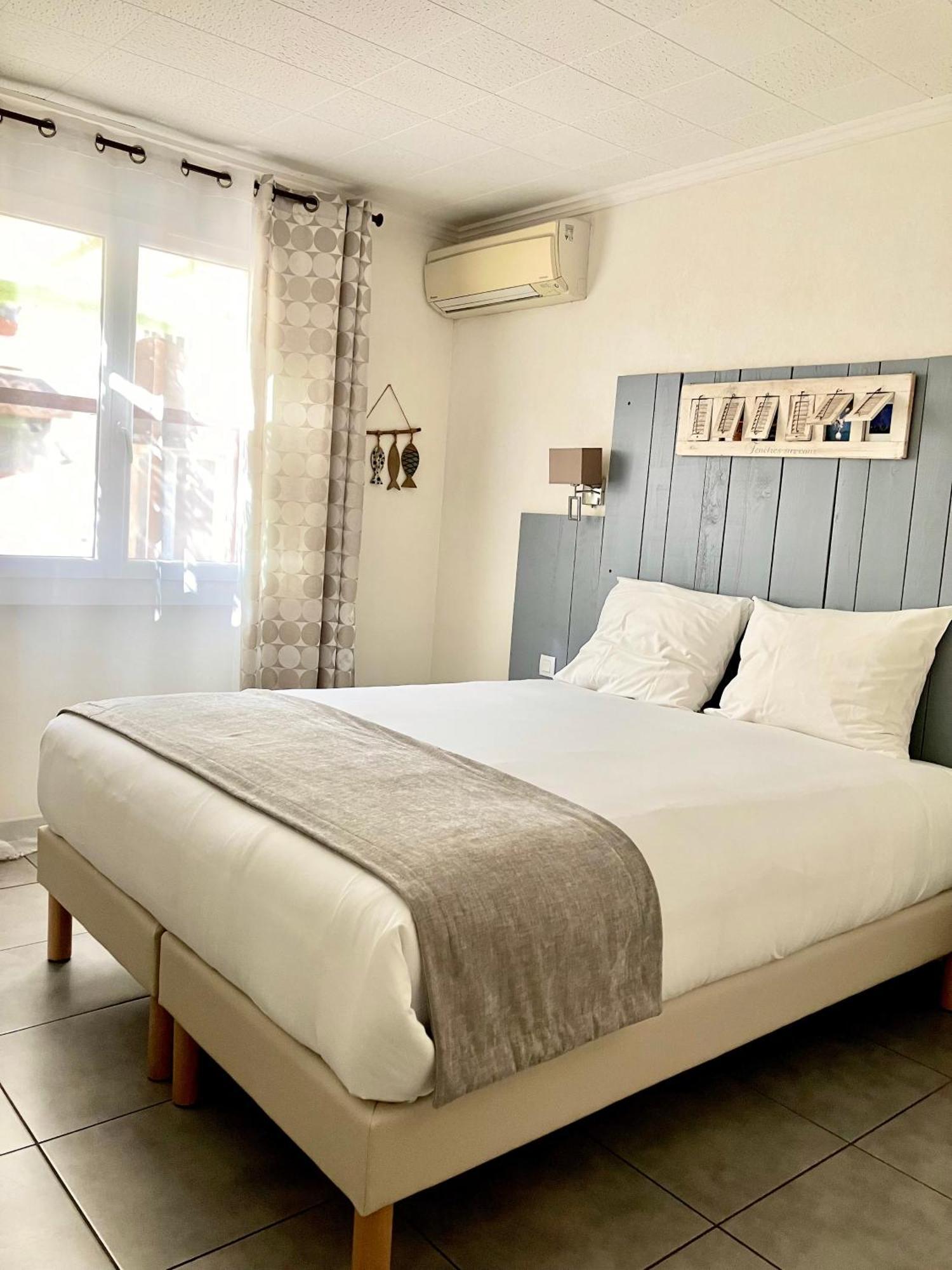 Hotel Lou Marques แซ็งต์-มารี-เดอ-ลา-แมร์ ภายนอก รูปภาพ
